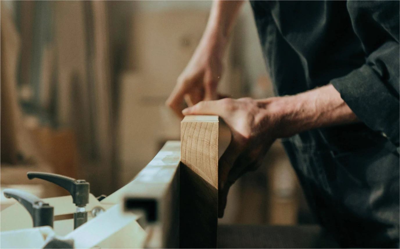 Nocado - owner making wood furniture